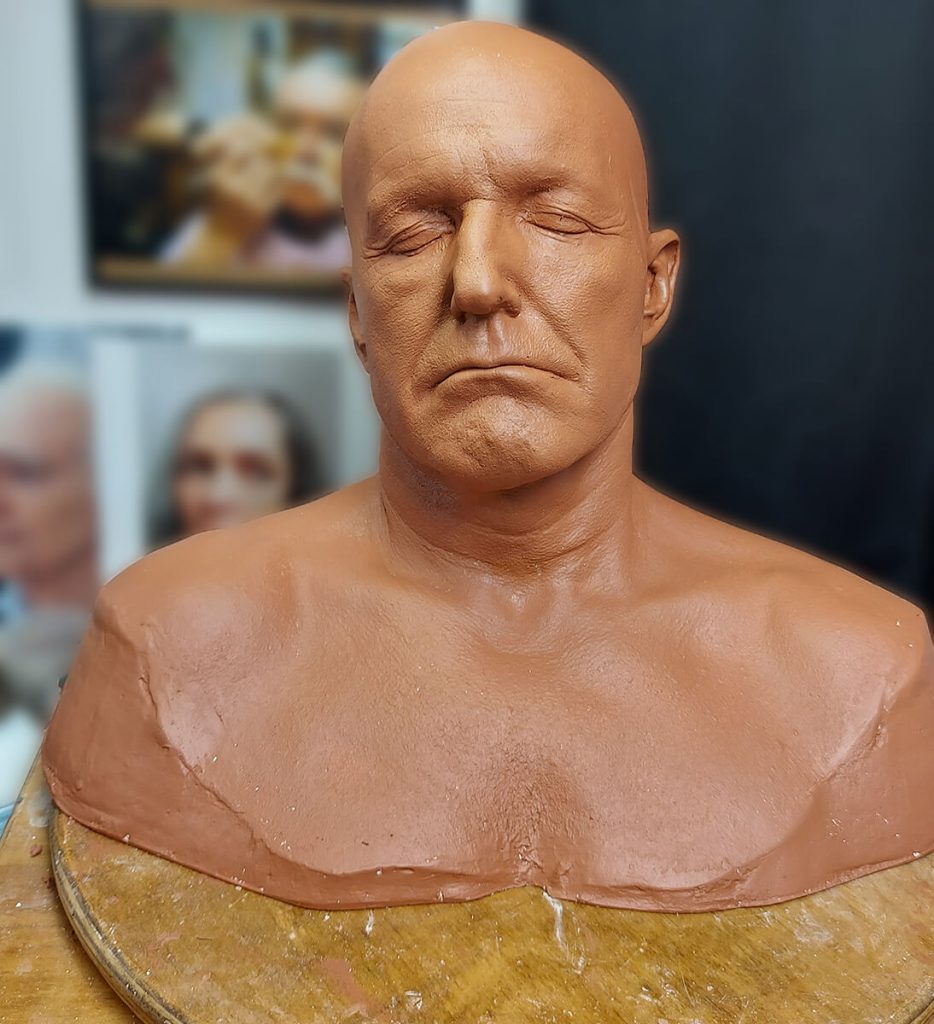 Painkiller - Smoothing out clay sculpture with sponges, brushes and solvents.